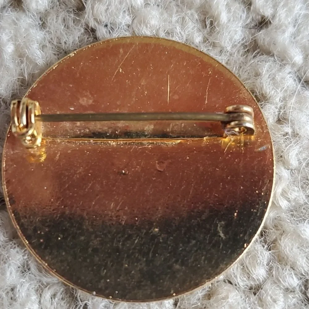 Gold tone H brooch round circular vintage